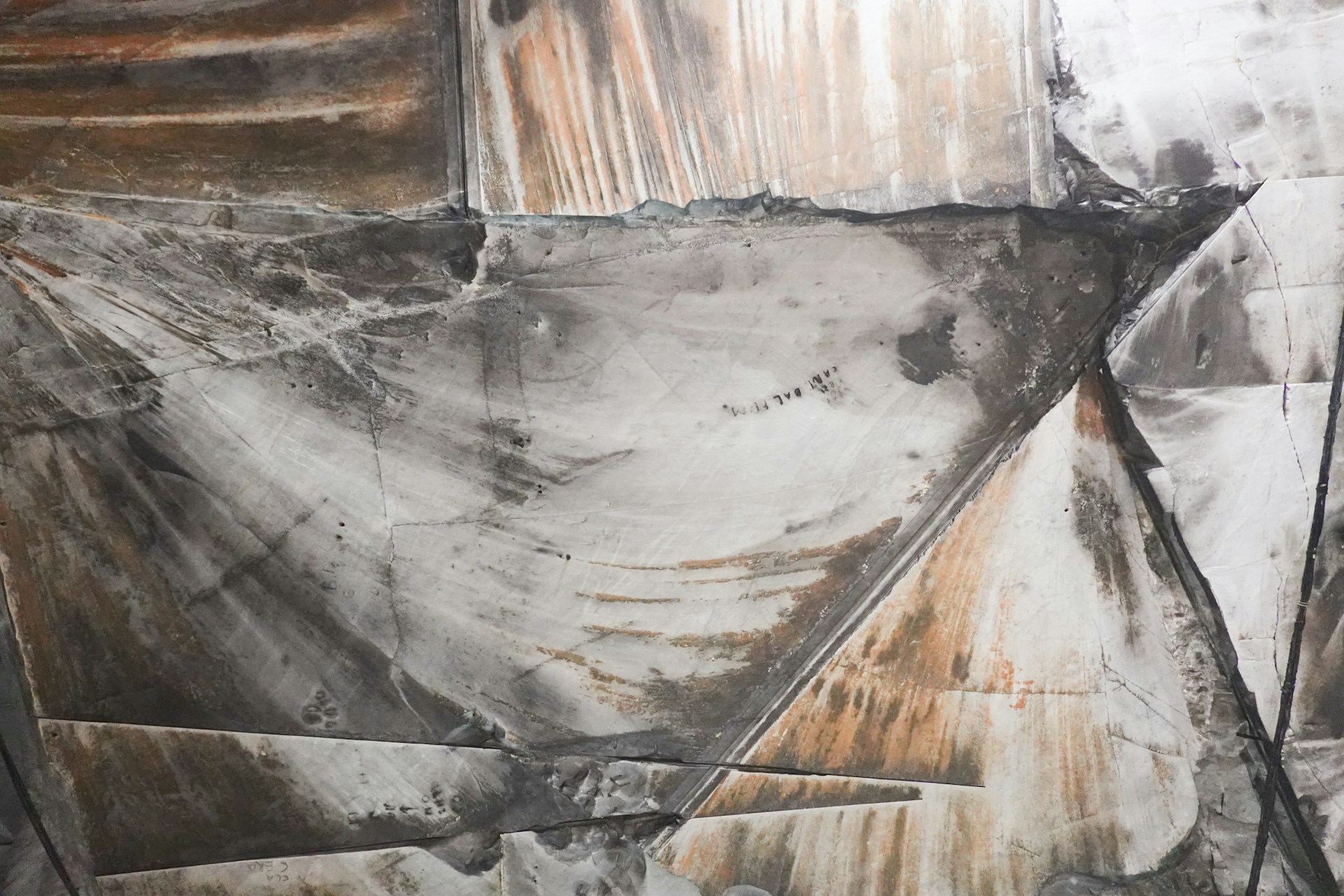 Carrara marble quarry face in the Apuan Alps, Italy — direct view from the extraction site